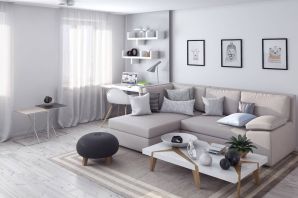 Интерьер комнаты с серым диваном