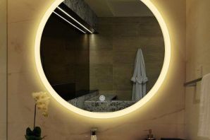 Большое круглое зеркало в ванной