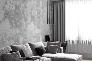 Серый угловой диван в интерьере гостиной