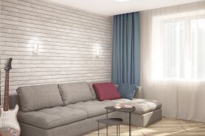 Интерьер гостиной с серым диваном