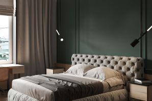 Спальня с зеленой кроватью