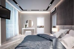Серый натяжной потолок в спальне