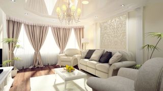 Белая гостиная с бежевым диваном