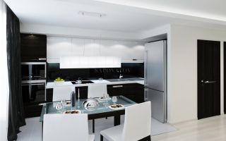 Серый холодильник в интерьере белой кухни
