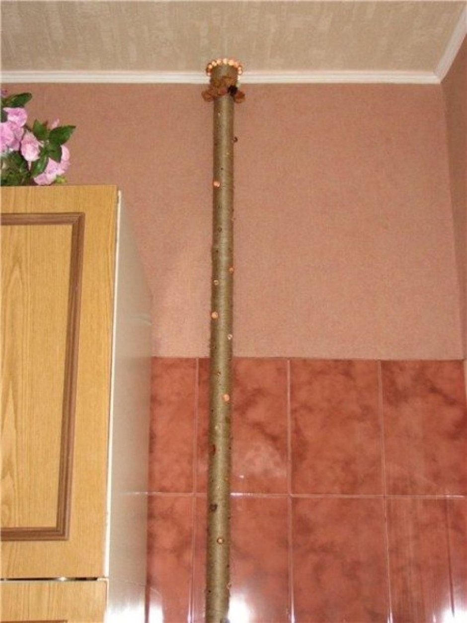 Способы декорирования газовой трубы на кухне