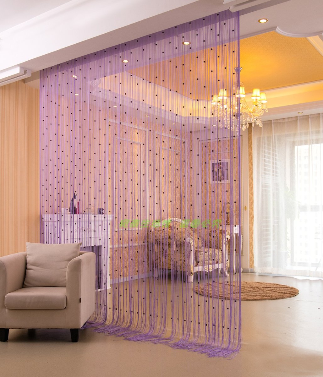 Зонирование комнаты шторами