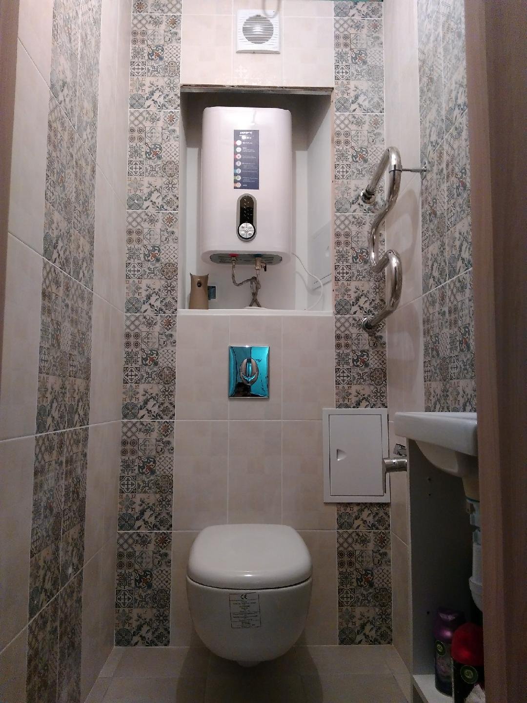 Как спрятать водонагреватель в ванной, не испортив дизайна комнаты