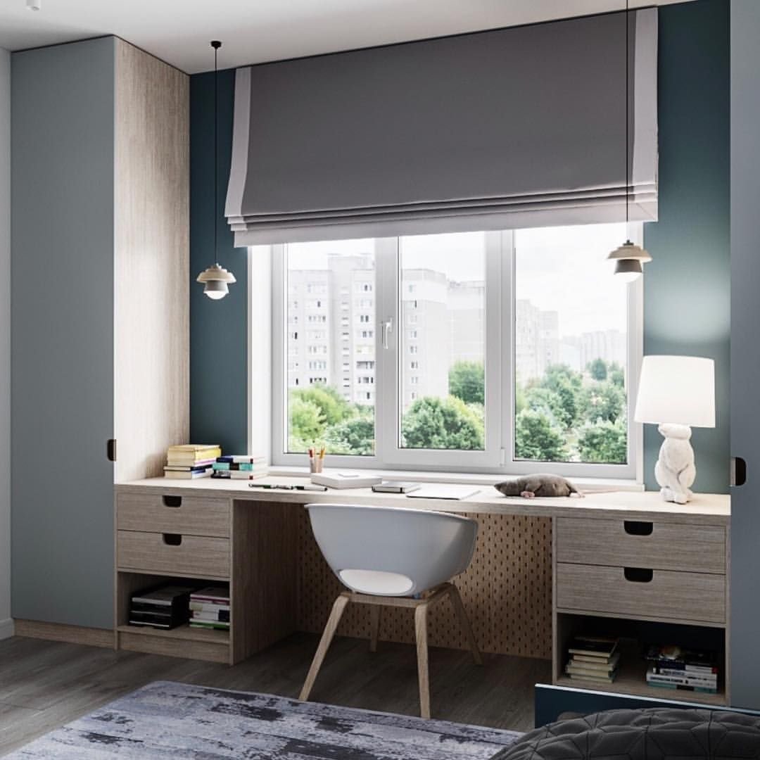 Письменный стол около окна