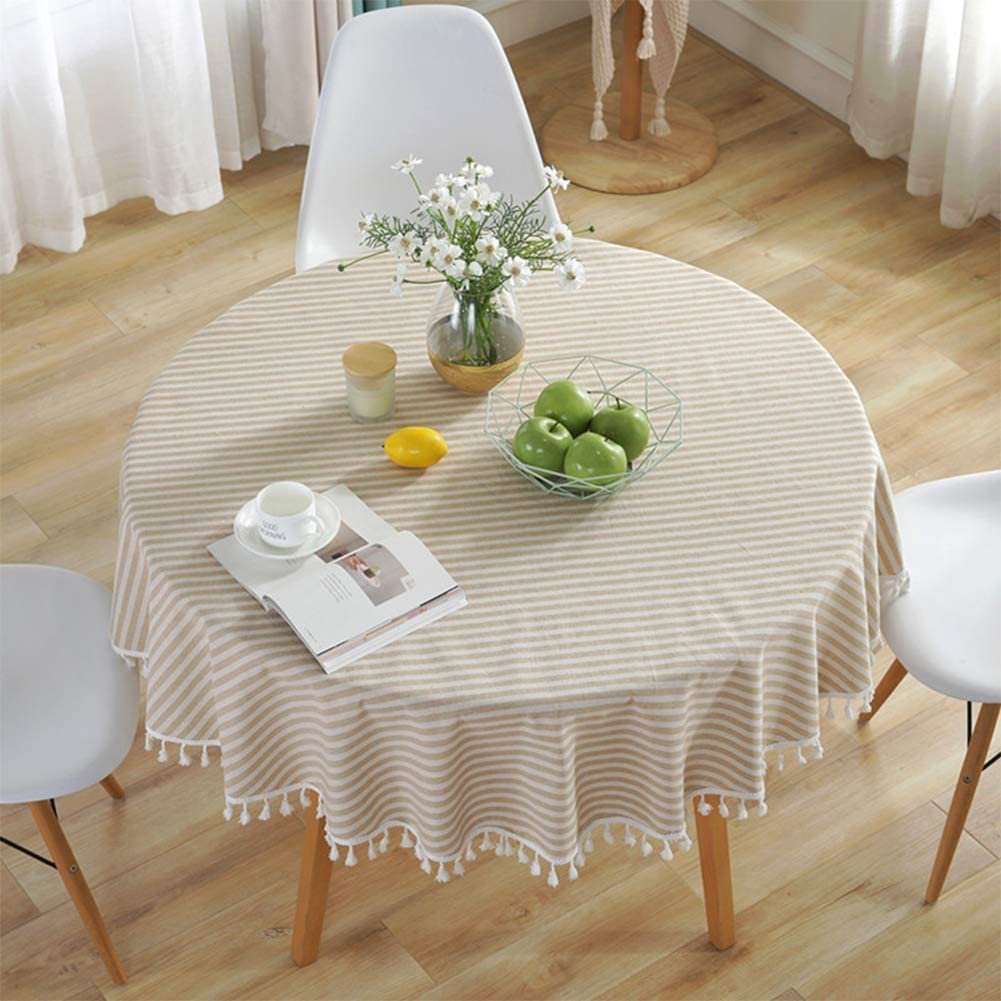 круглый стол со скатертью в интерьере гостиной фото