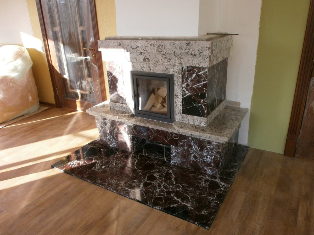 Отделка камина из мрамора