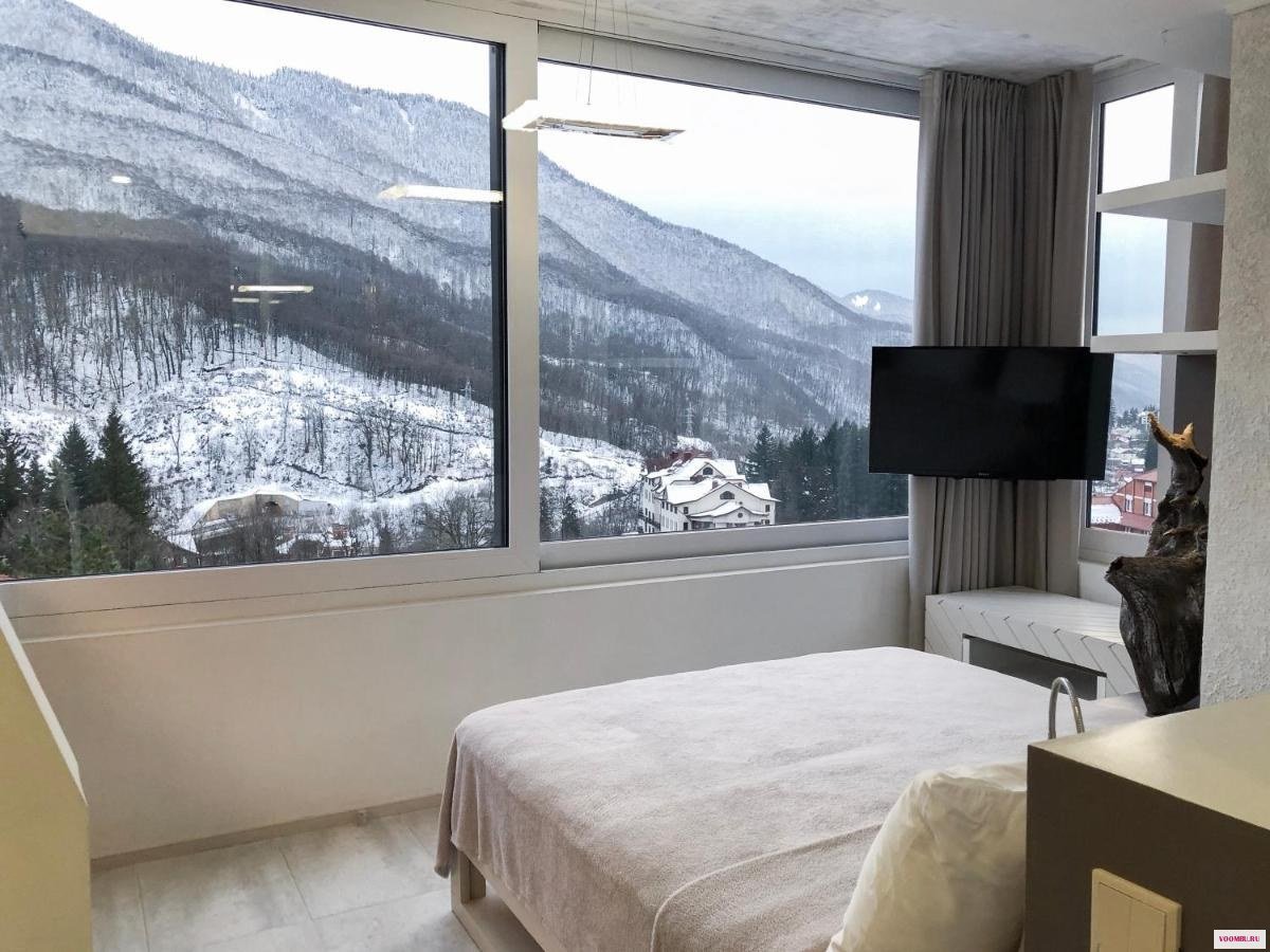 спальня с видом на горы