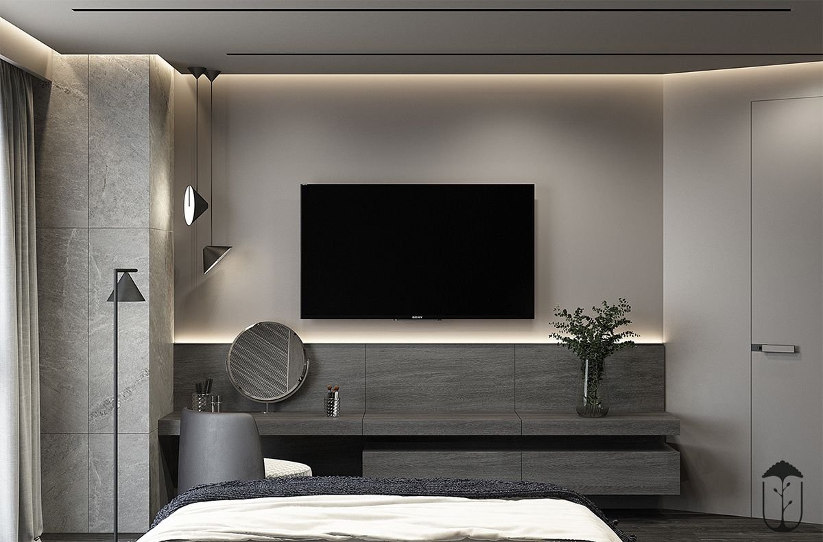 Телевизор в спальне перед кроватью