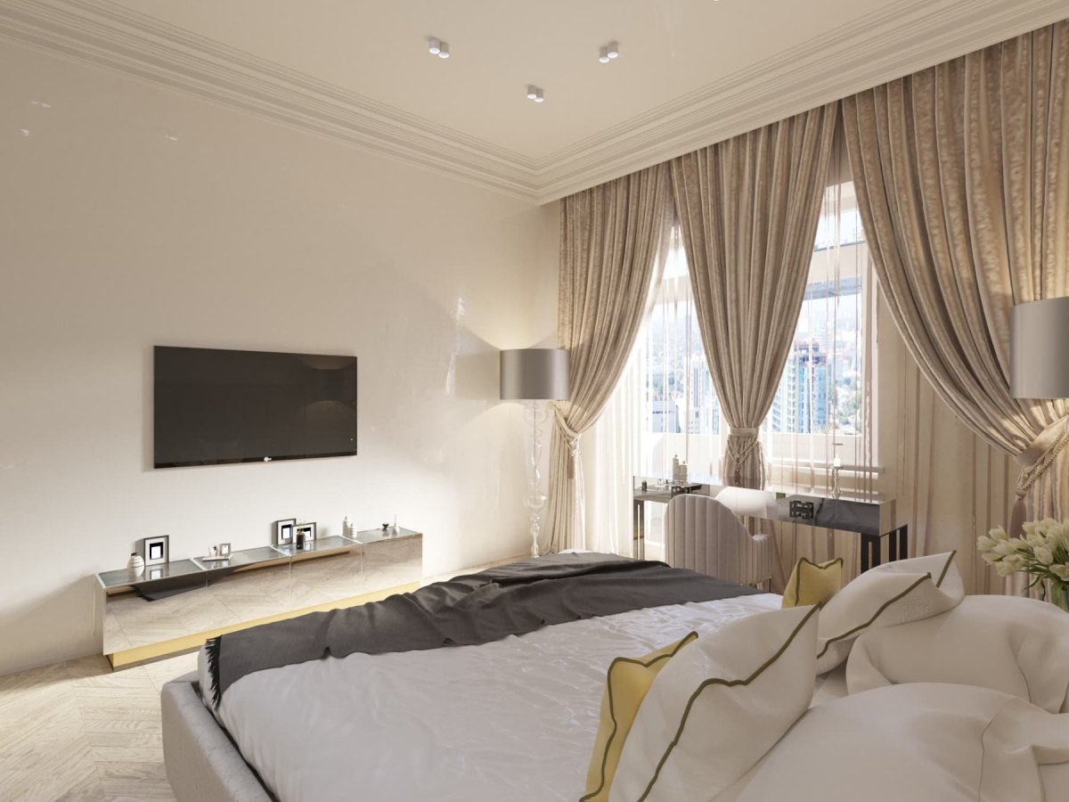 Кровать между окнами в спальне