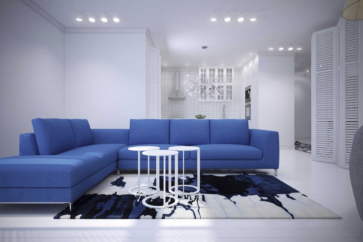 Темно синий диван в интерьере
