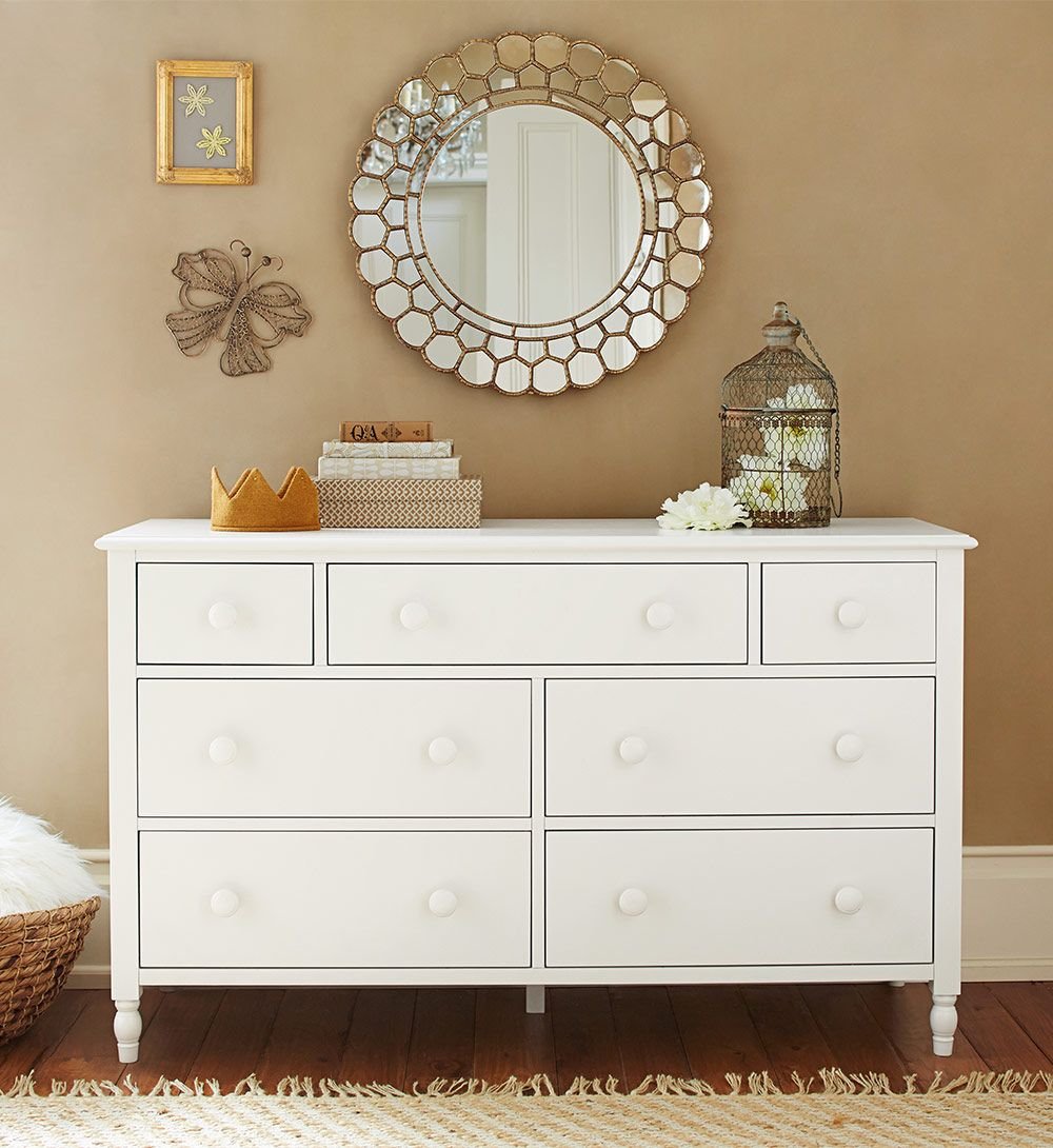 Часы над комодом