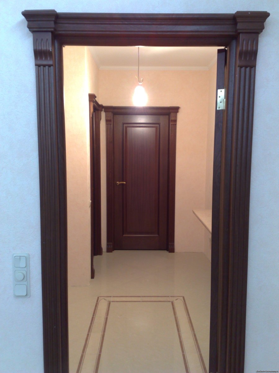 Отделка проема доборами и наличниками