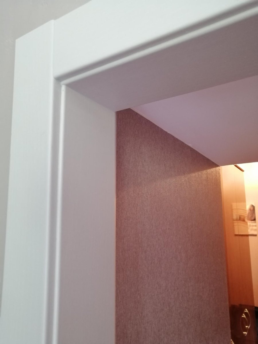 Проем двери из доборов и наличников